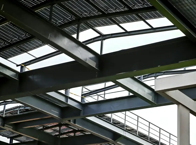 Steel beams and roof framing on a building under construction